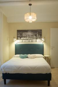 Voodi või voodid majutusasutuse Appartamento La Chicca toas