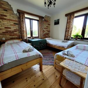 Posteľ alebo postele v izbe v ubytovaní Kasztanówka - dom gościnny na Podlasiu, agroturystyka