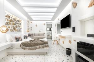 TV a/nebo společenská místnost v ubytování Liana Beach Hotel & Spa