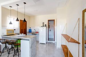 Recanto Casa de Itaúna tesisinde mutfak veya mini mutfak
