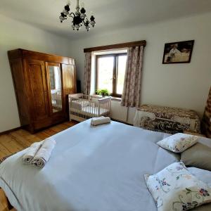 Posteľ alebo postele v izbe v ubytovaní Kasztanówka - dom gościnny na Podlasiu, agroturystyka
