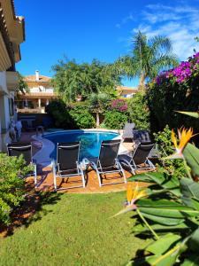 Zahrada ubytování VILLA RIVIERA CON PISCINA PRIVADA JUNTO AL CAMPO DE GOLF