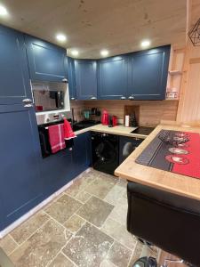 Cuisine ou kitchenette dans l'établissement Le Panorama D'Orcières