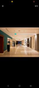 a hallway of a building with a large room at studio unit whit pool and gym in Istanbul