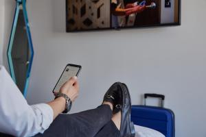 TV a/nebo společenská místnost v ubytování One Irapuato