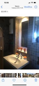 a bathroom with a sink and a mirror at Ines’s Dream in Stelida +47 photos