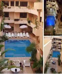 um hotel com piscina ao lado de um edifício em Hotel Costa Miramar Acapulco em Acapulco