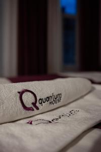 a folded napkin with a question mark on it at Quantum House in Vatra Dornei