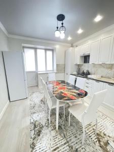 Kuchyň nebo kuchyňský kout v ubytování # 31 Элегантная и просторная квартира + 16 fotografií