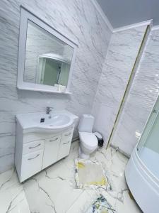 Koupelna v ubytování # 31 Элегантная и просторная квартира