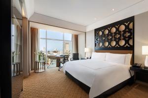 Rúm í herbergi á Hilton Lima Miraflores