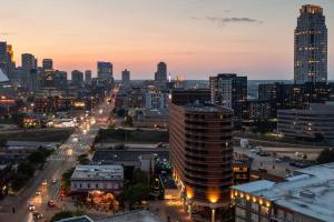 a view of a city skyline at night at Courtyard by Marriott Minneapolis Downtown in Minneapolis