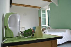 Кровать или кровати в номере Al Piccolo Scoglio - Room & Breakfast