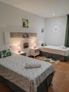 Postel nebo postele na pokoji v ubytování Las Salinas Rooms