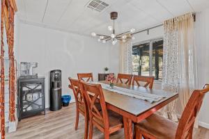 a dining room with a table and chairs at Harmony Hideout by Thunder Mtn, Peace Park! in Sedona