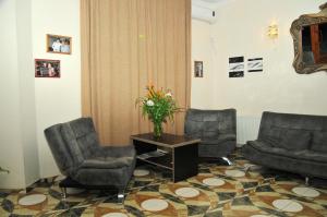 Χώρος καθιστικού στο Alma-Ata Hotel