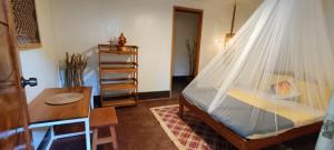 Postel nebo postele na pokoji v ubytování Sitio tourist inn