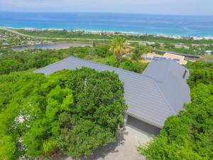 an overhead view of a house with trees and the ocean at Wilderness@OceanView in Wilderness