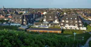 an aerial view of a city with houses at Dorint Strandresort & Spa Westerland/Sylt in Westerland