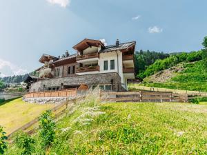 a house on the side of a hill at Drei Berge Top 7 in Saalbach Hinterglemm