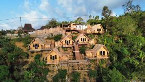 a house on the side of a mountain at Wanagiri sunset glamping in Gitgit