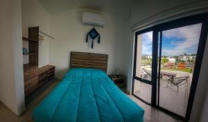 Postel nebo postele na pokoji v ubytování Casa Mayawell