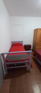 Una cama o camas en una habitación de Departamento Silvi