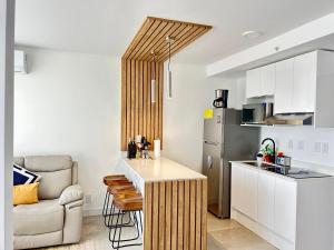 Køkken eller tekøkken på COZY STUDIO near SABANA CENTRAL PARK