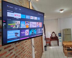 TV o dispositivi per l'intrattenimento presso Lucia Cottages