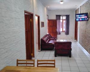 Area soggiorno di Lucia Cottages