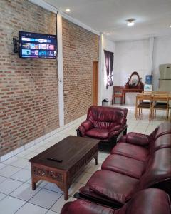 TV o dispositivi per l'intrattenimento presso Lucia Cottages