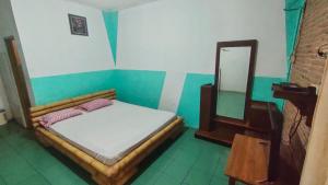 Letto o letti in una camera di Lucia Cottages