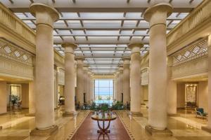 a view of the lobby of a building with columns at Sheraton Soma Bay Resort in Hurghada