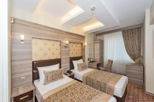 Letto o letti in una camera di Matiat Hotel Istanbul