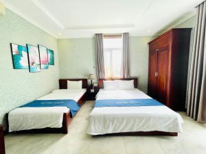 Voodi või voodid majutusasutuse LENA HOTEL toas