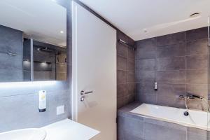 Koupelna v ubytování Apartment Bergtraum - modern, zentral und ruhig gelegen + 16 fotografií