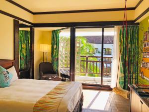 Voodi või voodid majutusasutuse Yoho Beach Resort Kenting toas