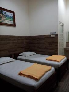 Krevet ili kreveti u jedinici u okviru objekta Rumah Tourist