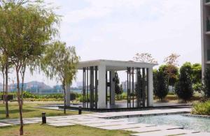 a pavilion in a park next to a pool at Studio Apartment Liberty Arc, Ampang in Ampang