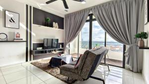 TV a/nebo společenská místnost v ubytování Tebrau Southkey Midvalley