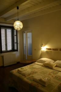 Postel nebo postele na pokoji v ubytování Dragonfly B&B