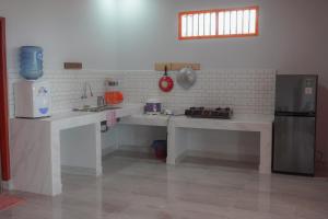 Kuchyň nebo kuchyňský kout v ubytování Tobay Family Home
