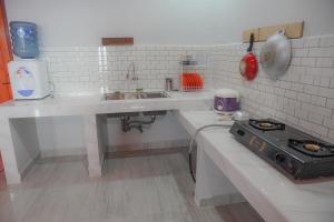 Kuchyň nebo kuchyňský kout v ubytování Tobay Family Home