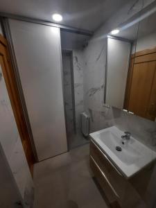 Kúpeľňa v ubytovaní Apartamentos Sudestada