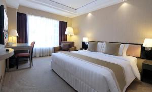 Krevet ili kreveti u jedinici u okviru objekta Prudential Hotel