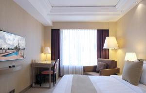 Krevet ili kreveti u jedinici u okviru objekta Prudential Hotel