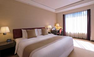 Krevet ili kreveti u jedinici u okviru objekta Prudential Hotel