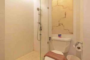Ett badrum på Atlantis Condo Resort pattaya by LJ