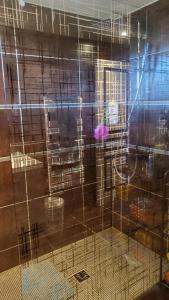 a cage with a bird inside of a room at cazelle in Figeac +15 photos