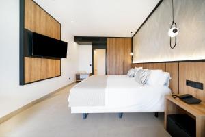 Posteľ alebo postele v izbe v ubytovaní Bull Vital Suites & Spa Boutique Hotel - Only Adults